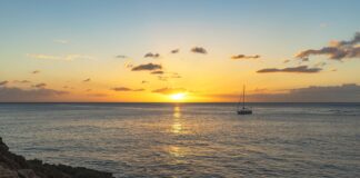 37 Free Things To Do in Oahu Sunset with Sailboat at Electric Beach
